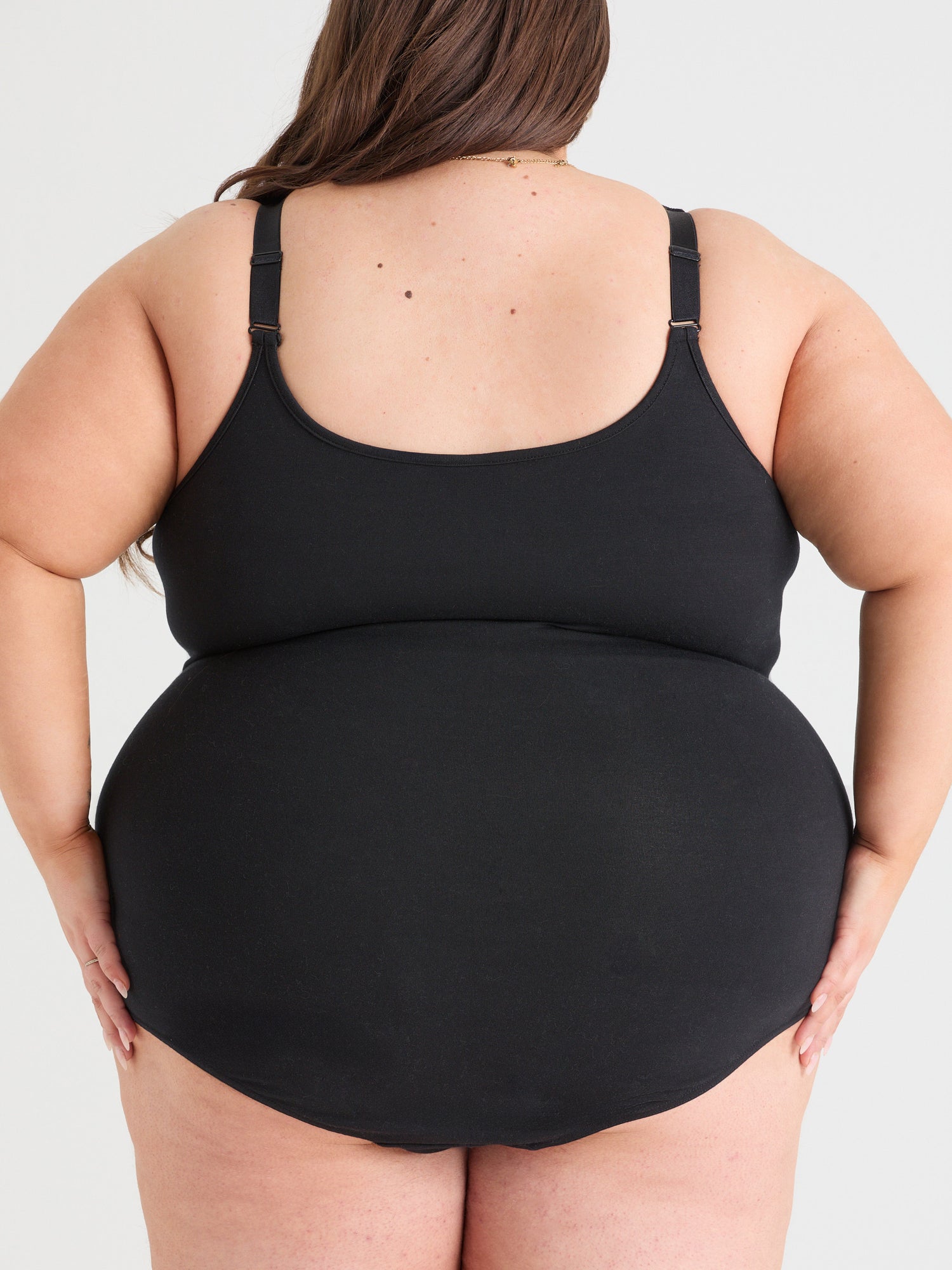 Bodysuit i bomuld med stropper