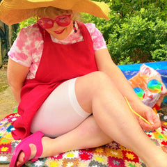 Woman wearing white chub rub shorts